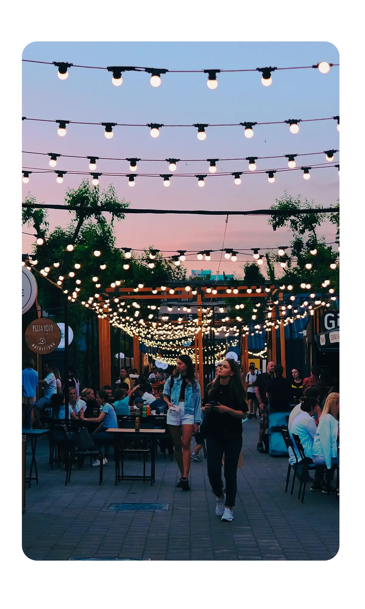 Photo of outdoor food market at dusk